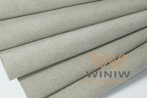 Conas an leathar microfiber maith agus olc a idirdhealú?